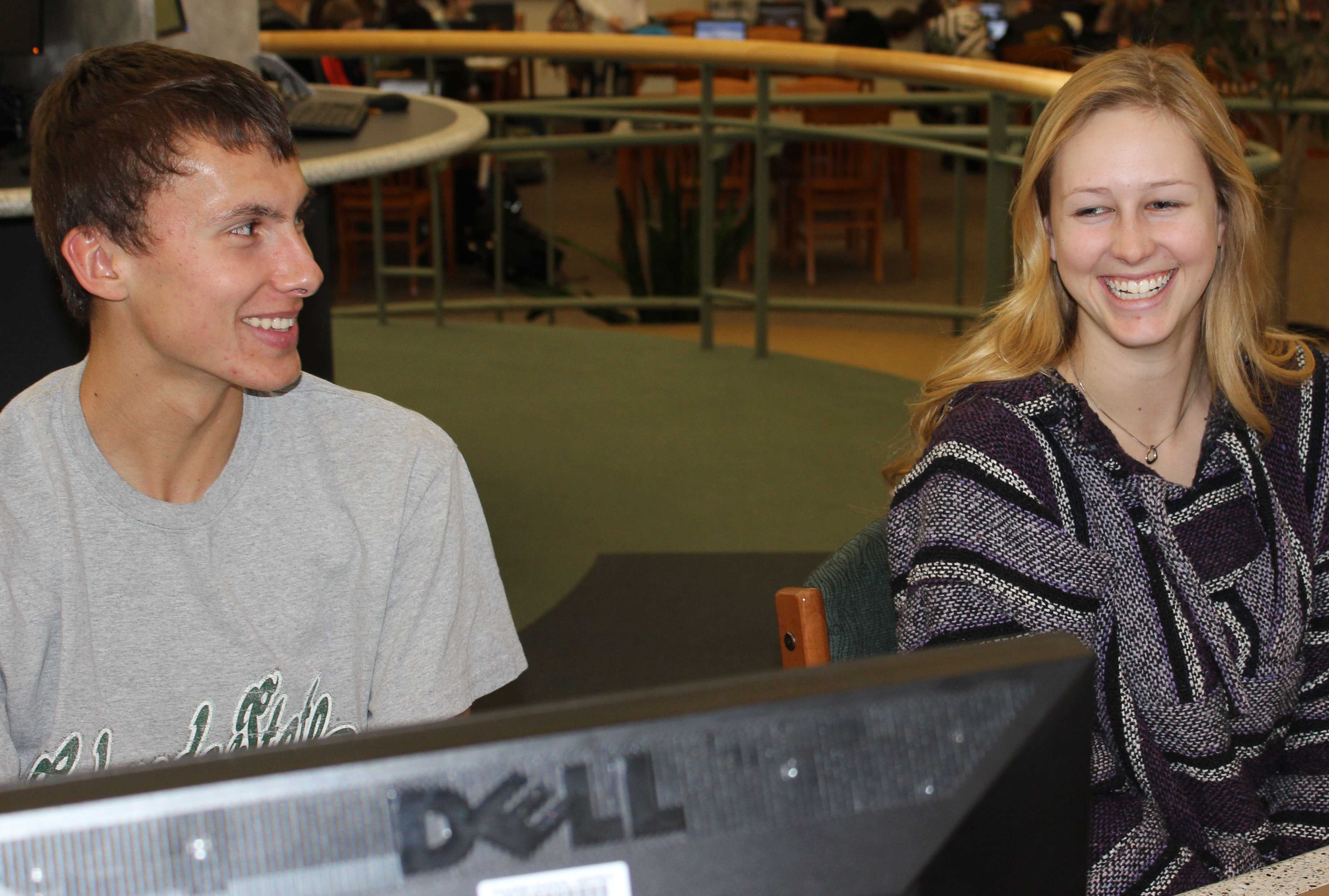 Seniors Aaron Bonenberger and Kelly Evans laugh at each other. 
Photo By: Amber Baack