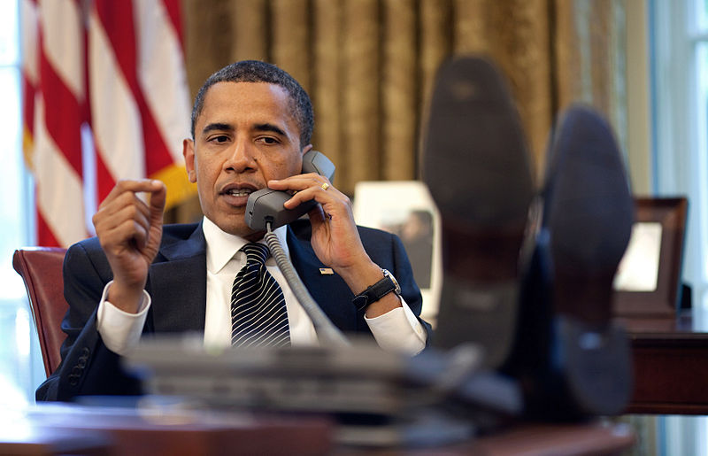 Barack Obama on the telephone. Photo credit: Wikimedia Commons