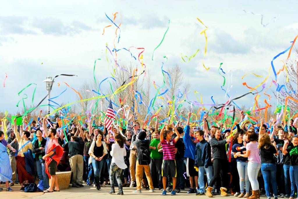 For one of the last shots of the project, FRHS students flung streamers into the wind in front of the school. 
