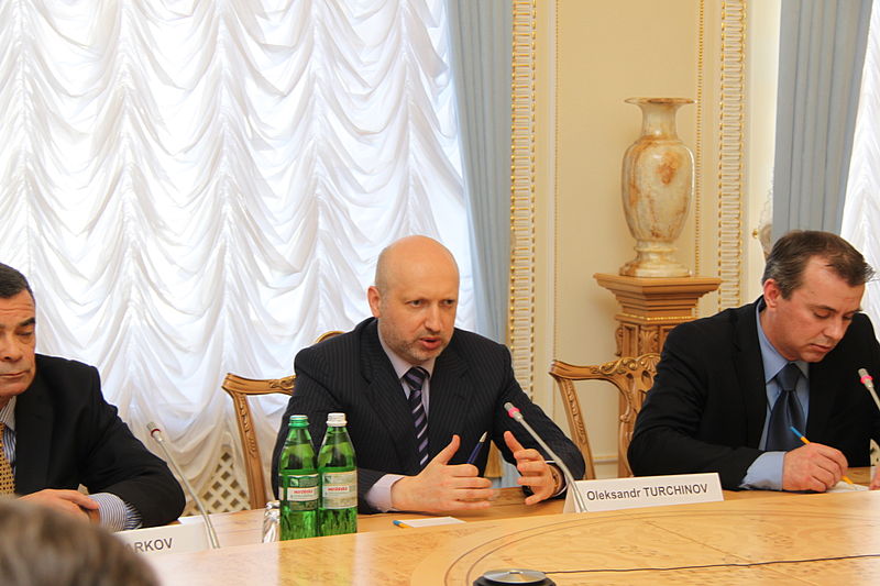 Oleksandr Turchynov, the acting president on Ukraine, sitting in on a meeting 
