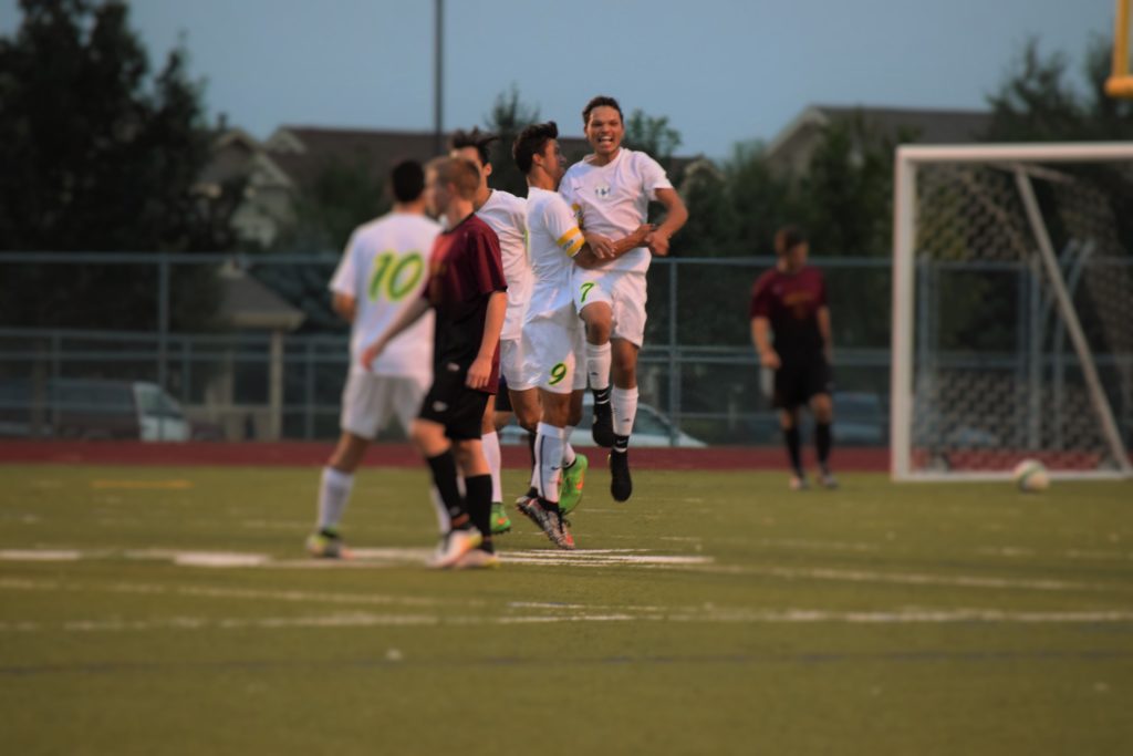 Chavarria celebrates his goal with Martinez. Photo Credit: Haley Rockwell