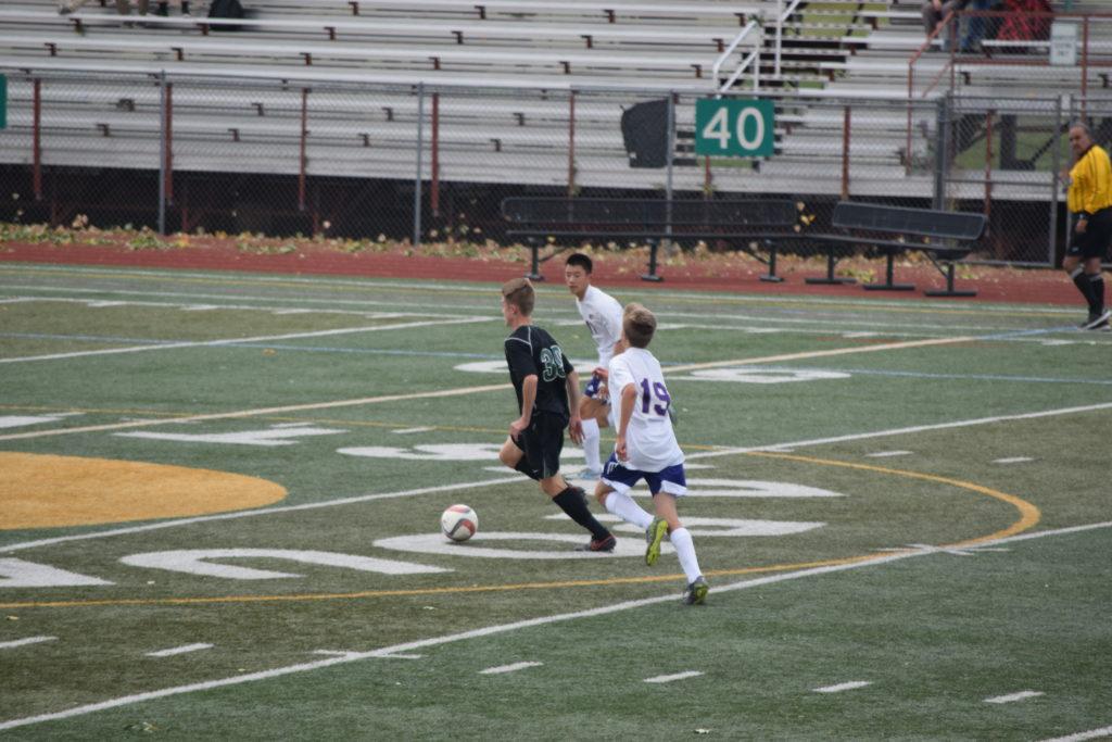 Crosstown rivals prove their soccer skills