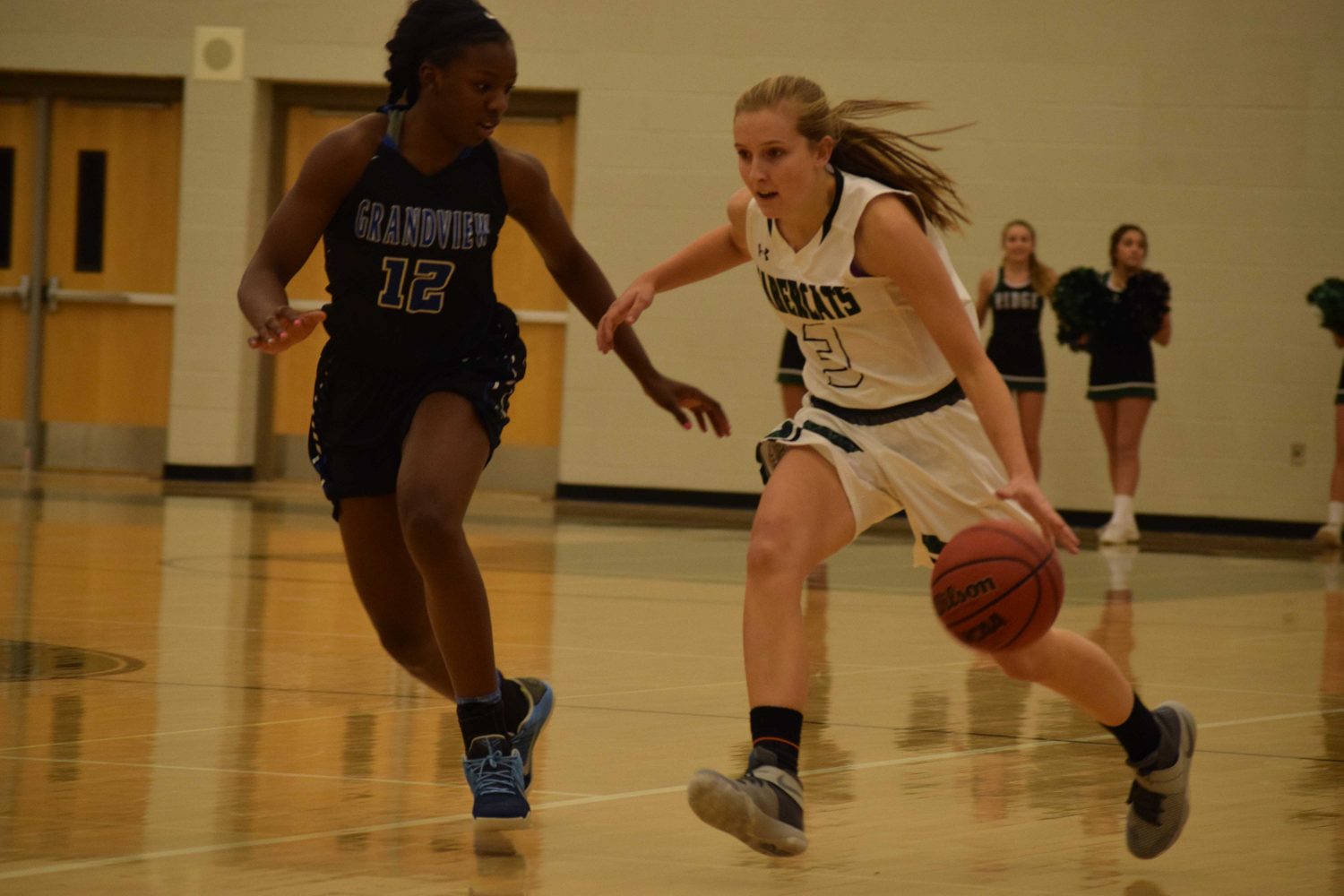 Ashley Steffeck takes on UCLA commit, Michaela Onyenwere from Grandview. Photo Credit: Haley Rockwell