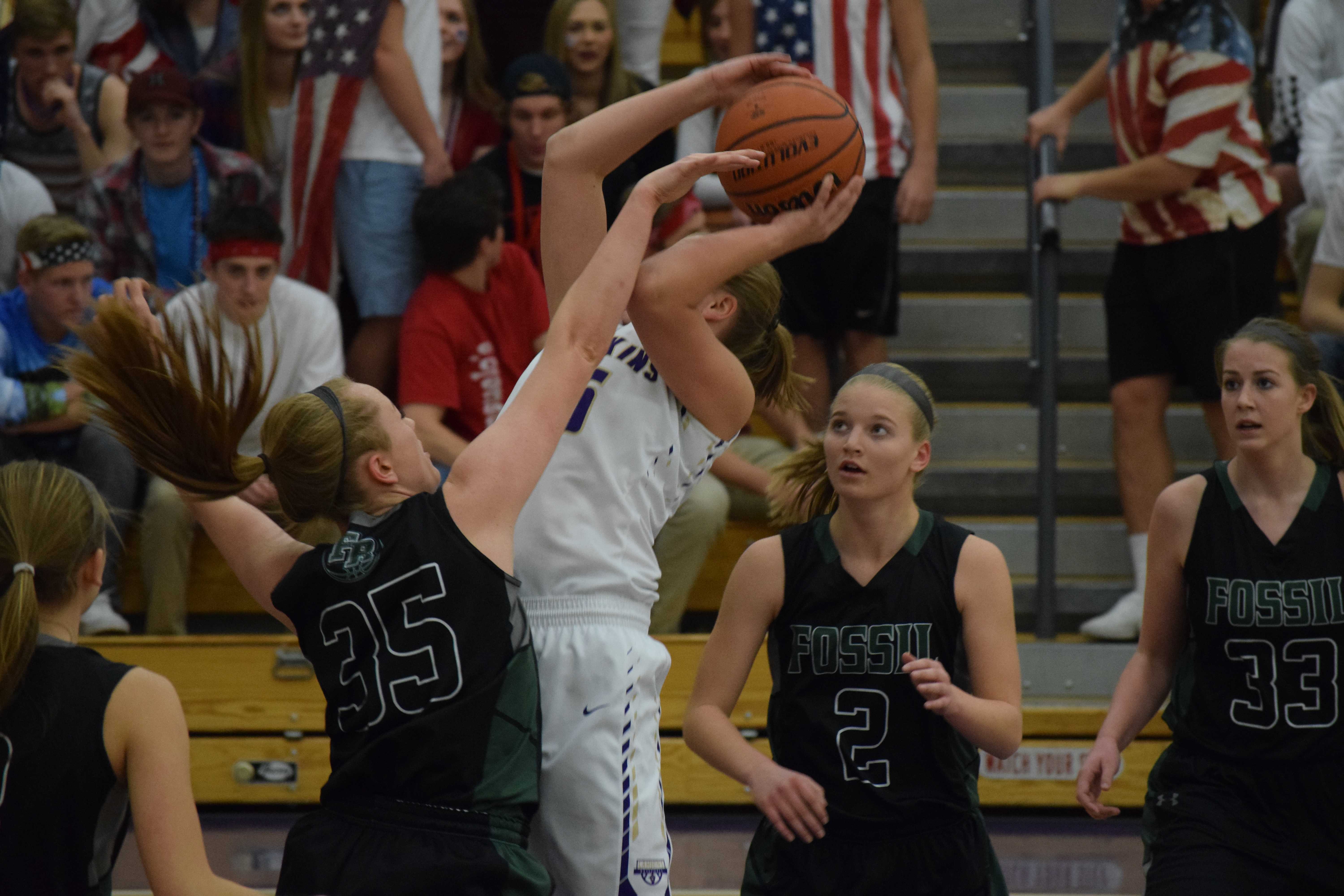 Reilly Dunn attempts to block Delsie Johnsons shot but ends up fouling her. Photo Credit: Haley Rockwell
