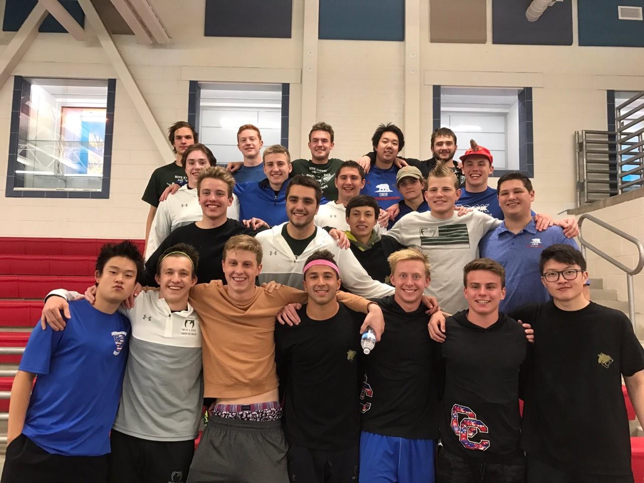 Boys swimming dives into first place