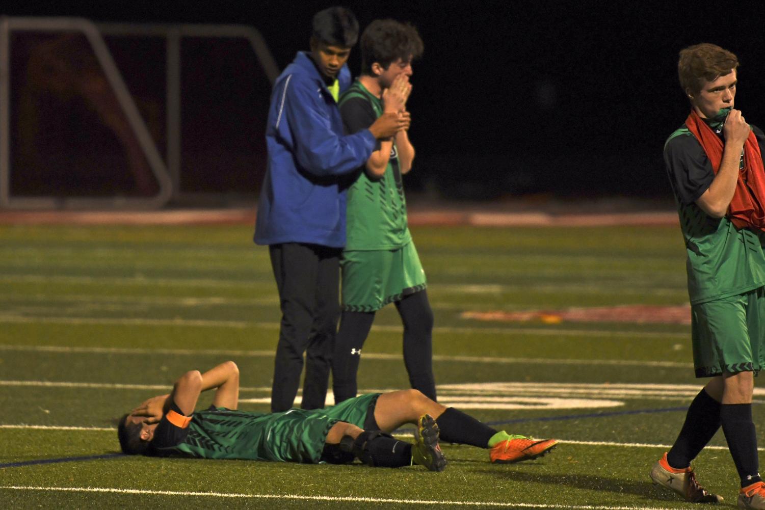 Devastation. Boys soccer came so close to advancing to the third round of state and defeating No.1 Denver East. Photo Credit: Mrs. Carlton
