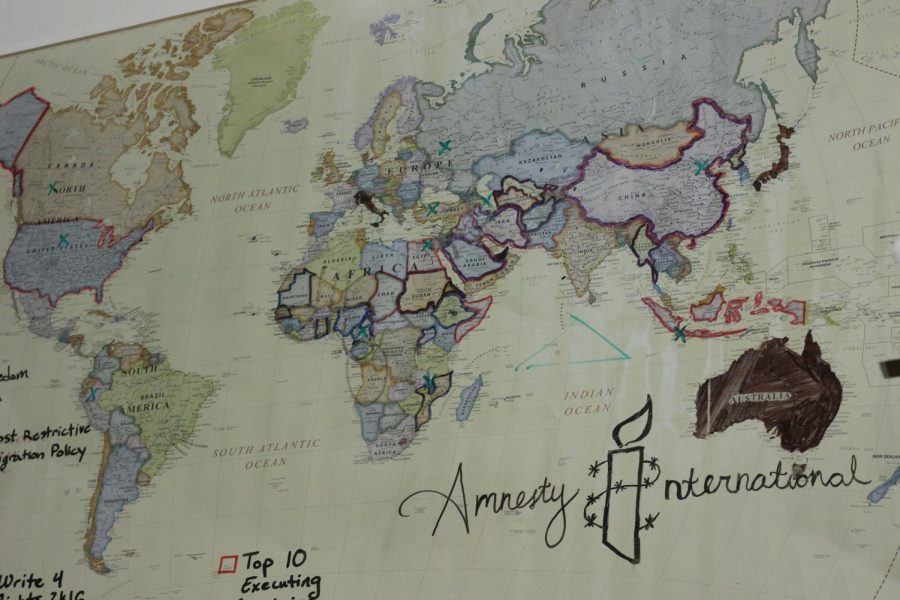 A world map in room W105, where Amnesty International is holding its event.  Photo Credit: Karen Manley