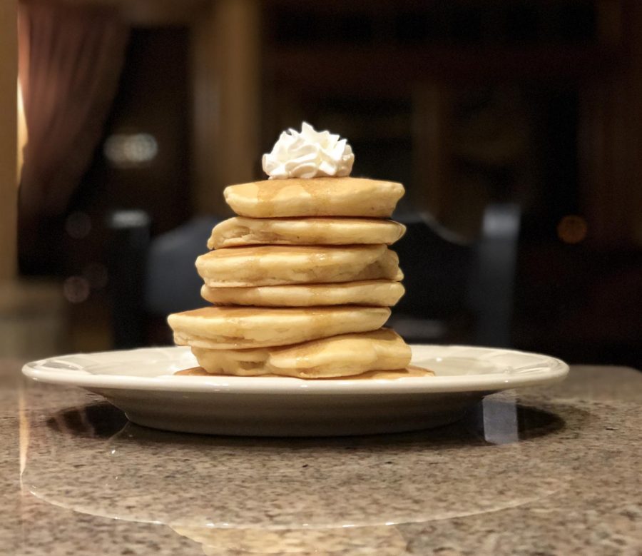 Fluffy pancakes with whipped cream. Photo Credit: Milena Brown