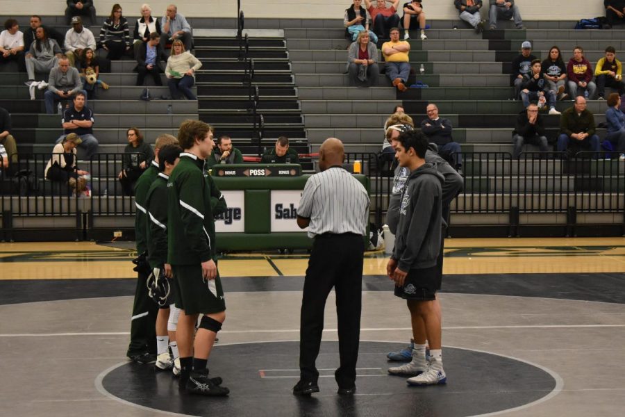 Fossil captains stare down the Mountain Range captains prior to the dual. Photo Credit: Adam Waters