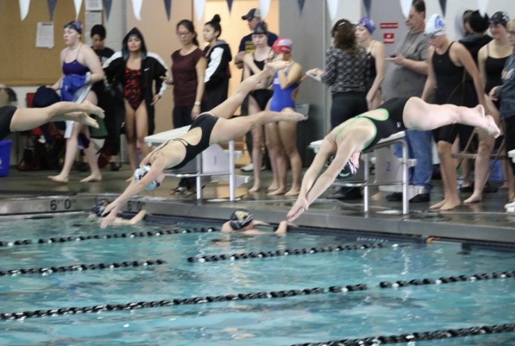 Girls swimming and diving team receives first at the city meet