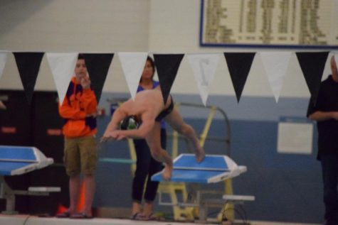 Fossil Ridges Boys swimming and diving team beat Cherry Creek
