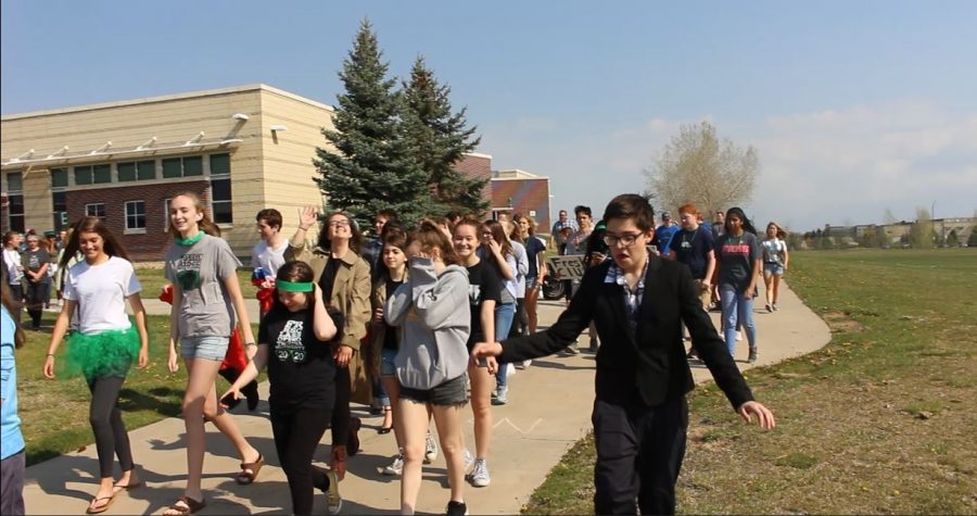 Fossil students rush from their locations in the building to the gym for the final moments of the Lip Dub.