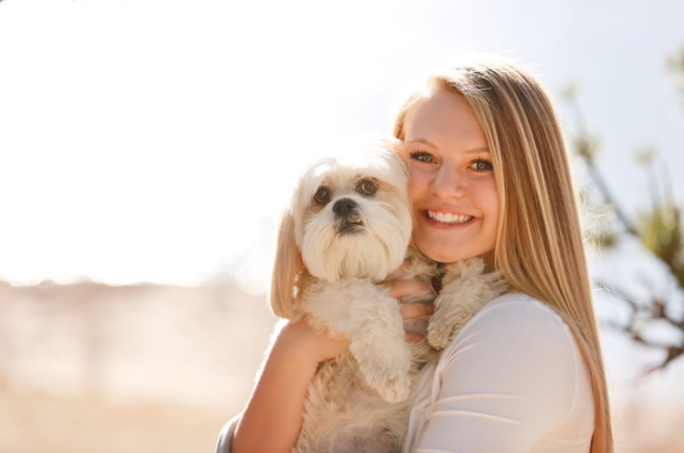 Macy Klein holding her dog