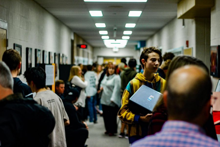 Students booths lined both sides of the halls around Fossils Performing Arts Center.