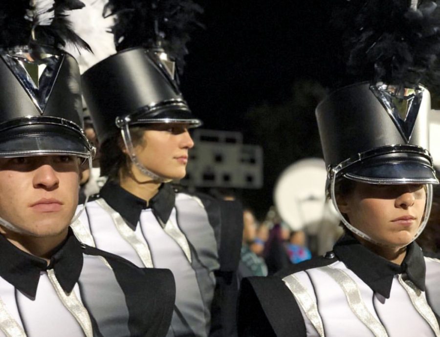 Drum Majors Jessie Griffith and Dawson Keally stand proud