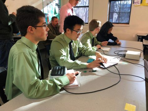 A Team prepares for the final round.