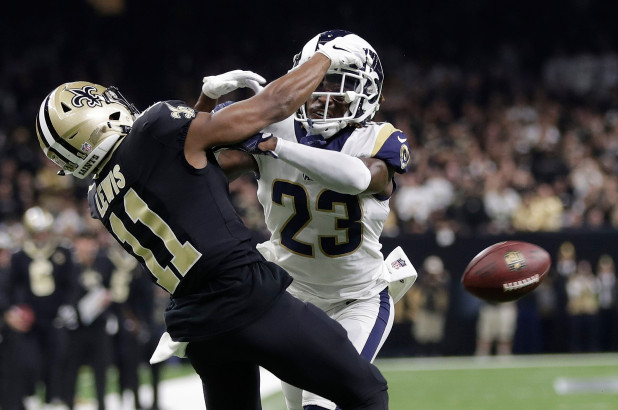 Rams cornerback Nickell Robey-Coleman, with his back to the play, takes out intended Saints wideout Tommylee Lewis in what shouldve been a flag.