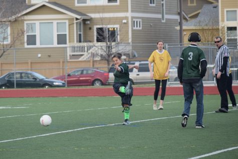 Dee White kicks off into the second half.