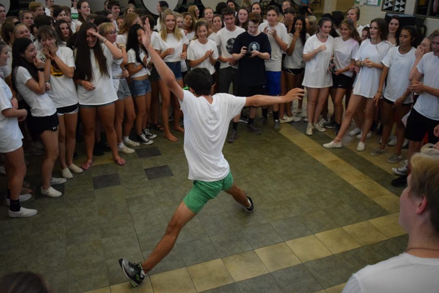 Junior Windrem Smith shows off his skills in the dance circle