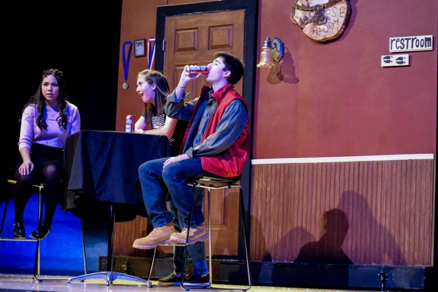 Sandrine (Chloe Iverson) the waitress (Natalie Anderson) and Jimmy (Connor Dalrymple) find themselves in The Moose Paddy, a popular place in Almost to get a drink.