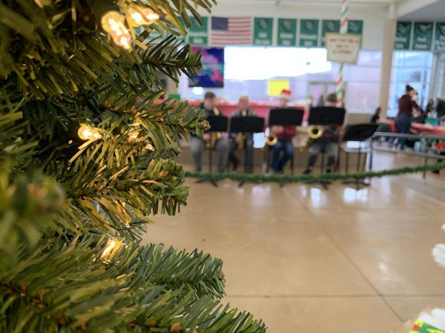 Band students play classic Christmas carols for the patrons.