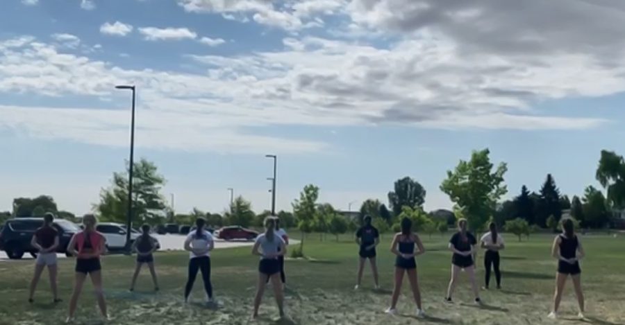 The Fossil Ridge High School Dance Team practices outdoors at Twin Silos Park during summer.