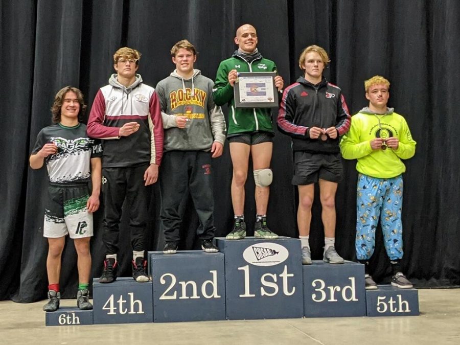The podium for 160lbs state finalists. Cody Ginther takes 1st place with Kolten Strait of Rocky Mountain in 2nd place. 