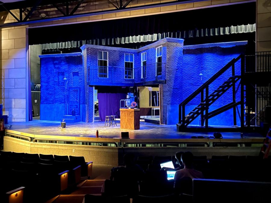 The nearly complete set in the PAC, as tech members try out different lighting settings.