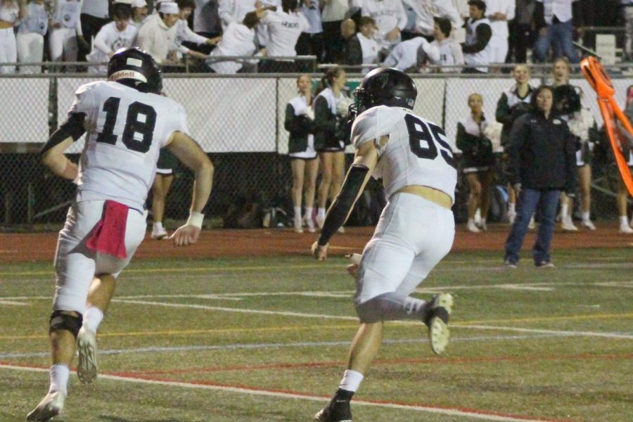 Quarterback Tyler Kubat celebrating with Nathan Hallmark after the opening touchdown