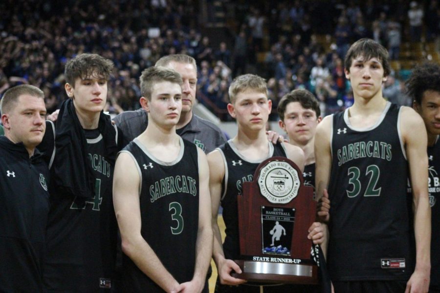Fossil Ridge holding their runner-up award after the championship game.