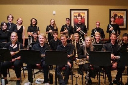 Fossil Ridge High School’s jazz band poses for a photo while promoting their fundraiser.