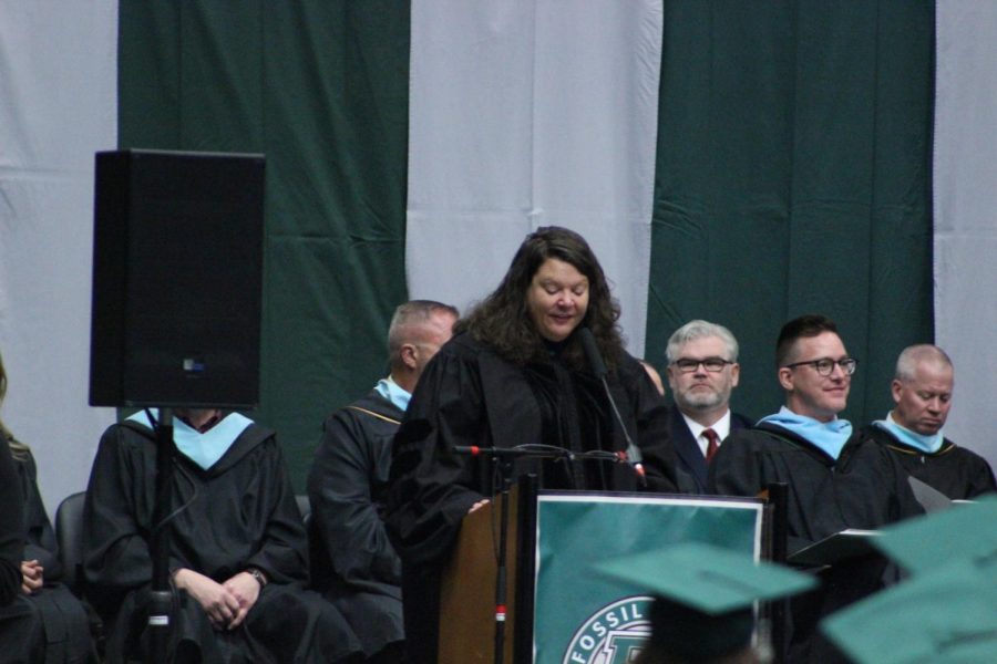 Doctor Julie Chaplain, principal of Fossil Ridge High School, deliveres her commencement speech. 