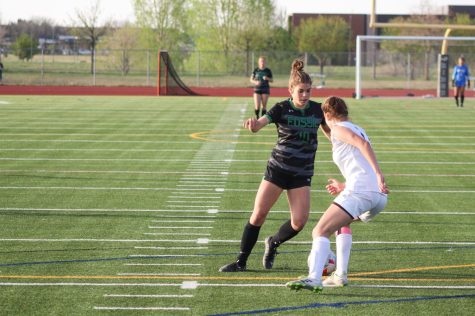 Forward Abby Ballek dribbling past a Castle View defender.