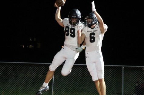 Receivers Dom Leone and Trek Keyworth celebrating after a touchdown.