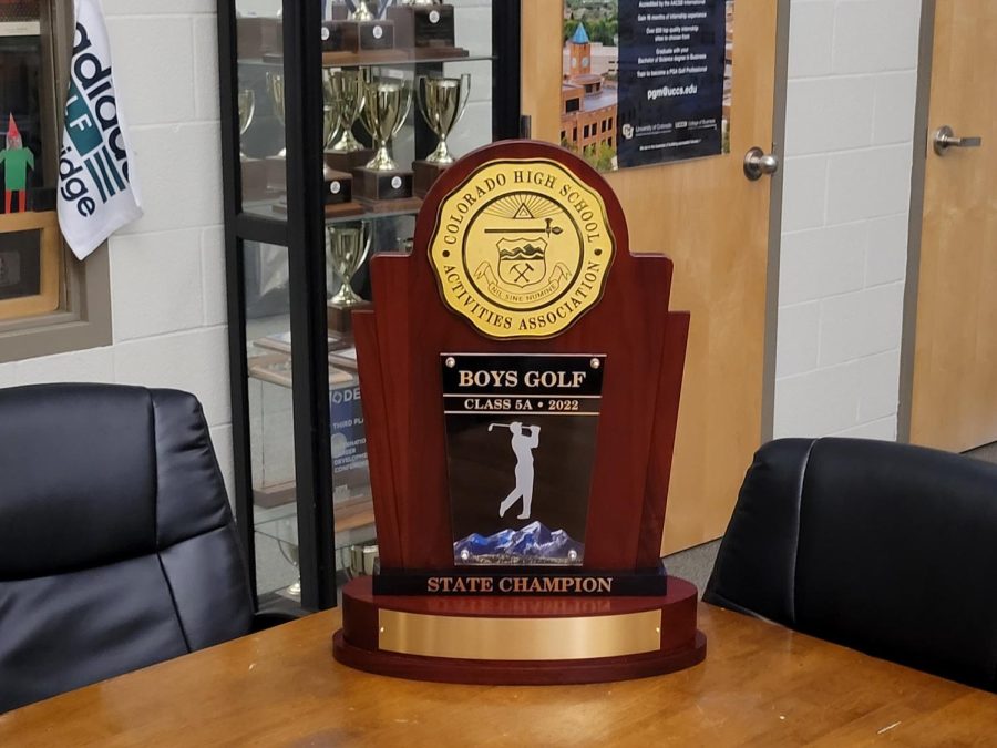 The 2022 5A Boys Golf Trophy in coach Jamie Menefees office. This marks Fossils second ever state title in Boys Golf.