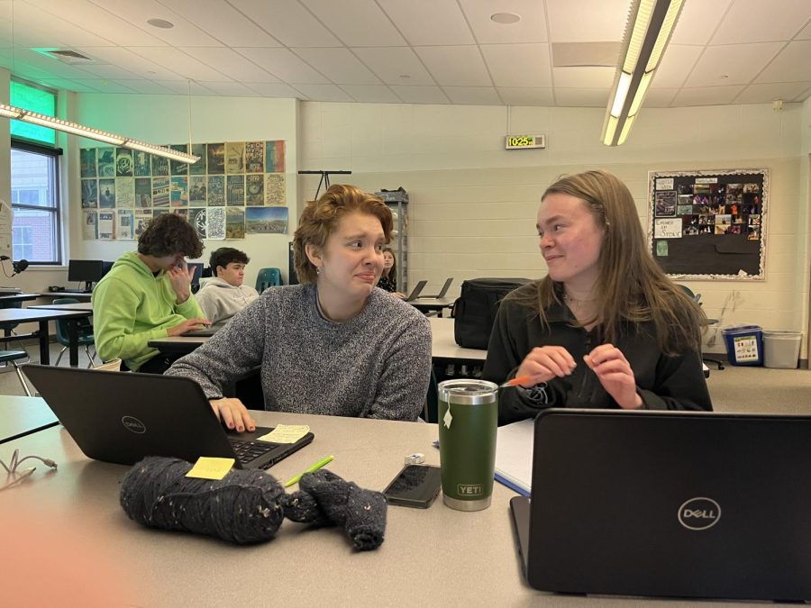 Lizzy and Jordan talking about past editors in the Journalism room. They have experienced many stories and antics in this room, and cannot wait to experience more. 