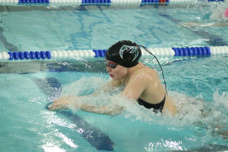 A Fossil Ridge swimmer during an early meet in Fort Collins.