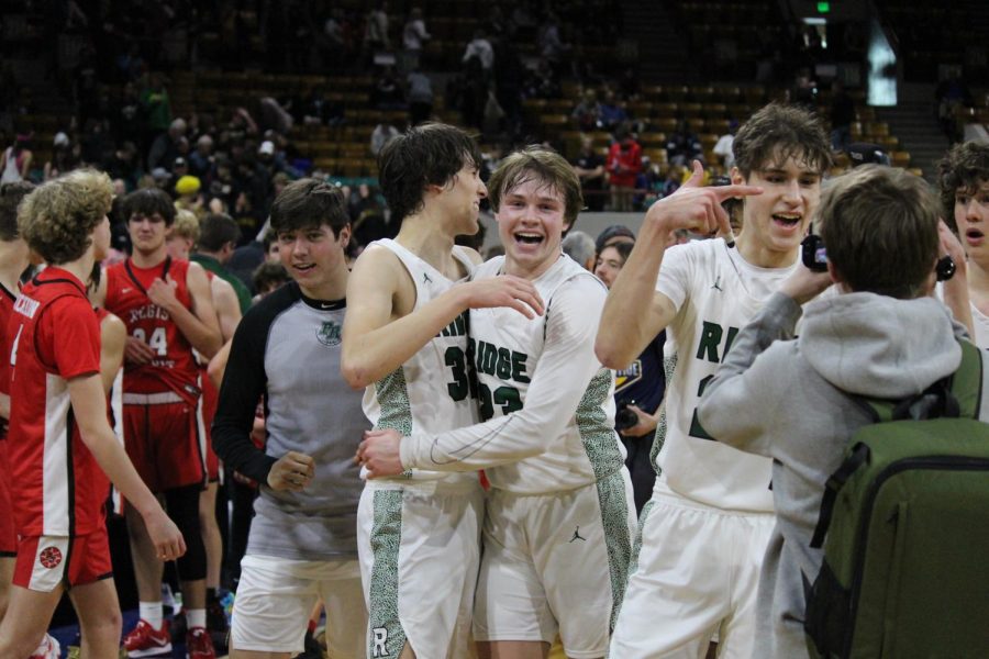 The Fossil Ridge team joyously celebrating after advancing to the state championship game for the second consecutive season.