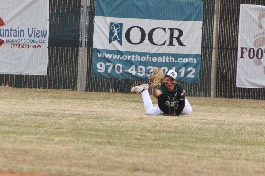 Brek Benedict after making a diving catch in center field against Erie.