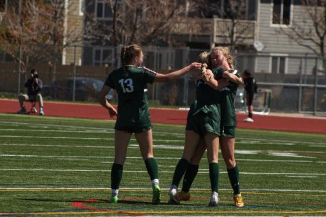 Fossil Ridge celebrating after a goal from Lily Wale against Pine Creek to put the Sabercats up 3-0. They went on to win the game 3-1.