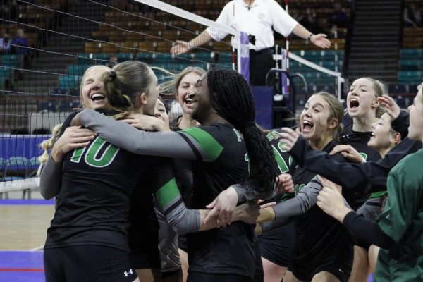 The Sabercats celebrating after their win.