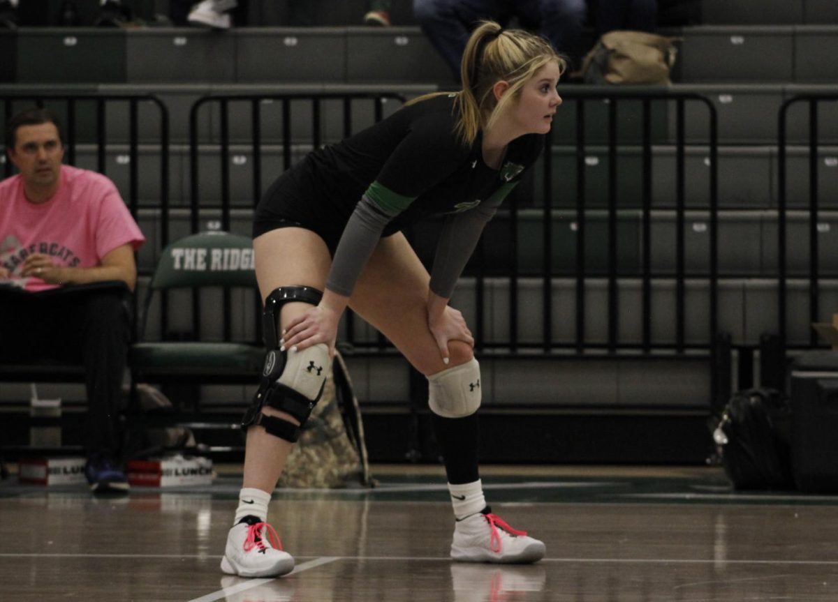 Burchett ready to pass before opposing team serves.