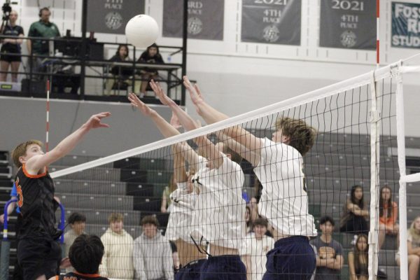All blockers going up in attempt to stop hit from Greeley Central offense.