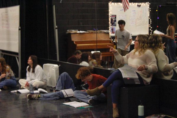 Mikayla Assmus gives instructions to the cast during their Act 2 run-through before Spring Break.