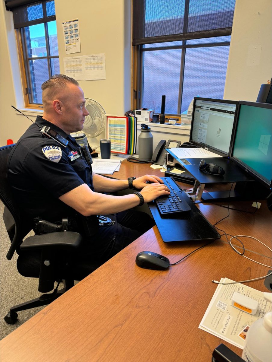 FRHS+School+Resource+Officer+Adams+Brunjes+believes+in+making+connections+with+students+while+helping+keep+the+school+safe.
