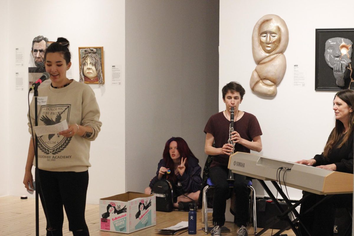 People volunteered to read out their poetry during an open mic time.