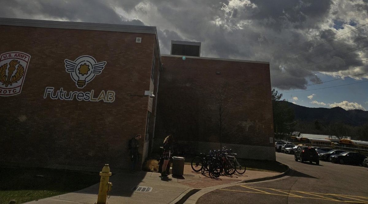 Students wait for buses home from the former Futures Lab.