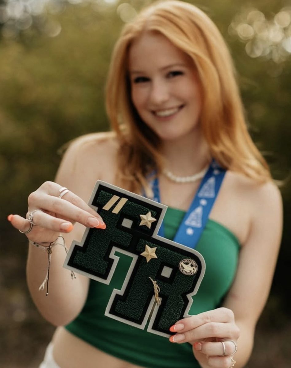 Sabercat Swim and Dive celebrates Sydney Oveson's commitment to Colorado State University as a Division 1 diver