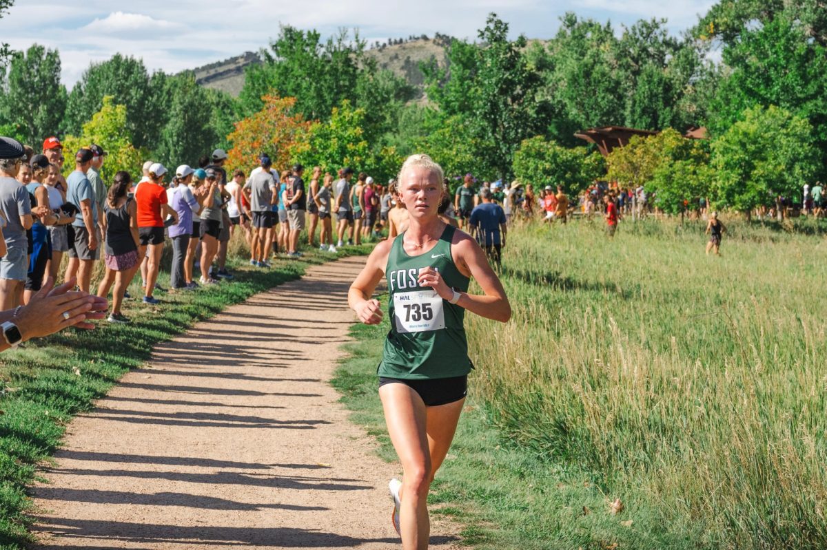 Leading the way at the Lobo Invitational, Tatum Berg races the 5k in one of the earlier races of the cross country season.