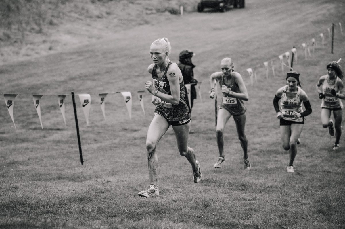 Racing up the notorious hills, Tatum Berg leads her team at Nike Cross Nationals.